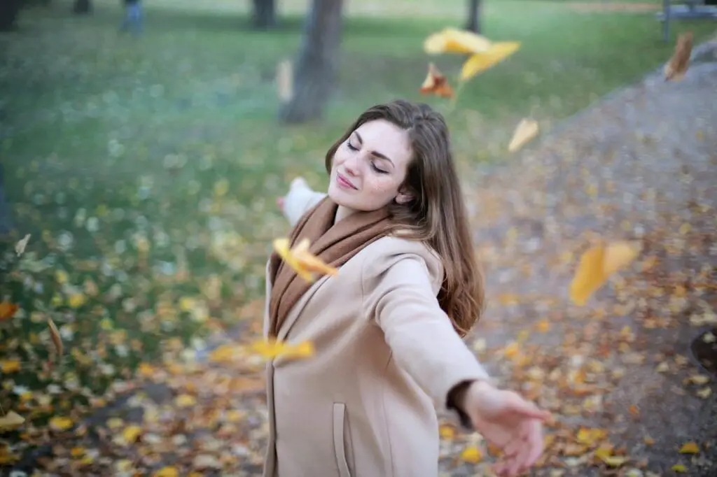 A girl is enjoying the weather.